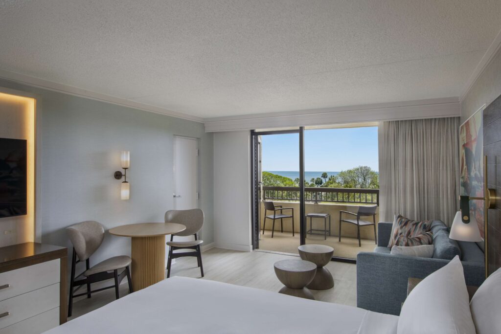 Room with balcony view and decorative accents.