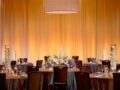 Event style decorated tables and chairs.