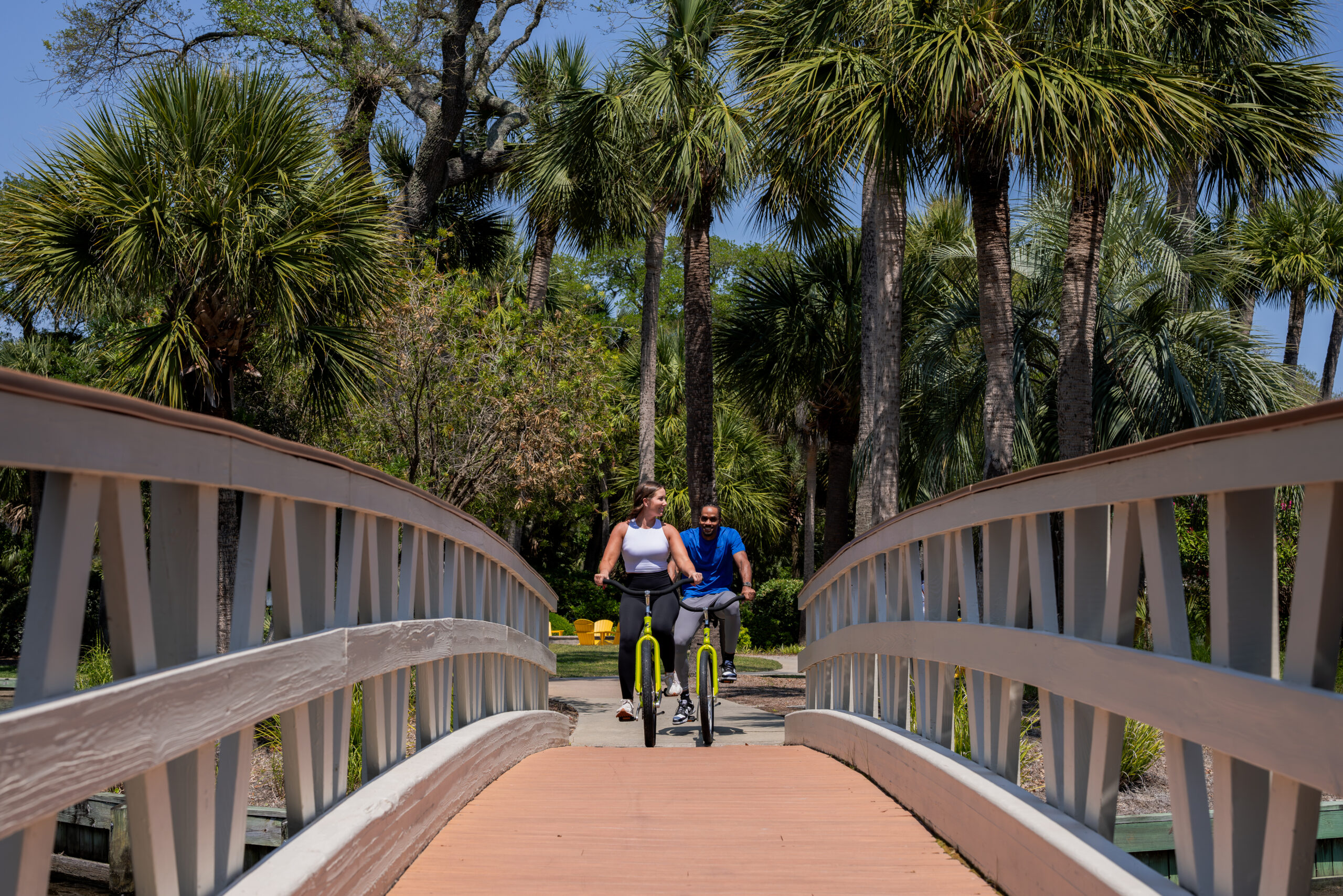 Hilton Head Island image of guests driving a bicycle around the resort.