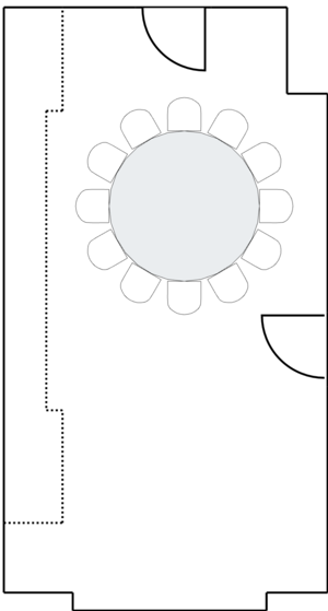 Small meeting room with a single round table.