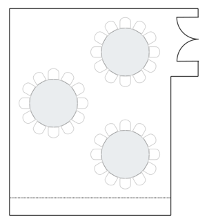 Meeting room layout with round banquet tables for guests.