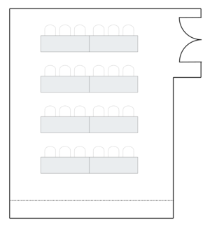 Meeting room layout with classroom-style seating arrangement.