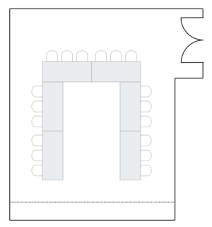 Meeting room layout with U-shaped table arrangement.