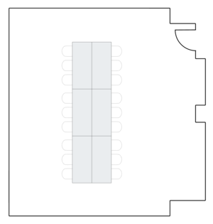 Small room layout with evenly spaced round tables.