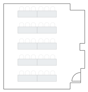 Small room layout with rows of rectangular tables.