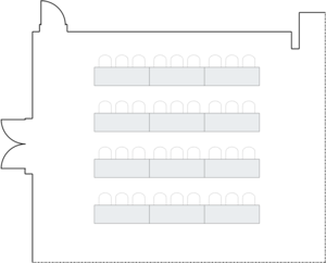 Meeting room layout with classroom-style table setup.