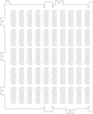 Large hall layout with classroom-style seating arrangement.