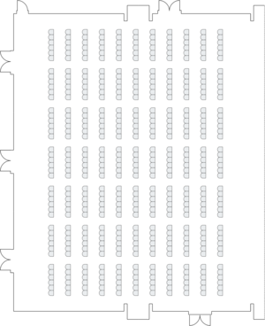 Large hall layout with theater-style seating for events.