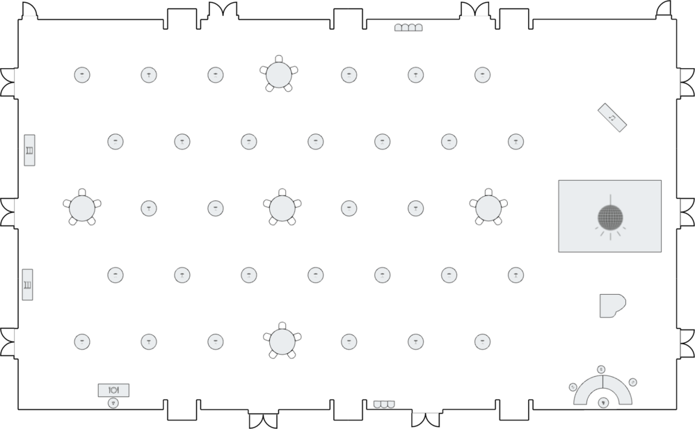 Open ballroom layout with sparse table arrangement.