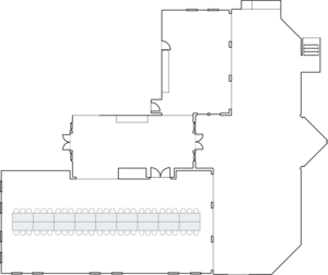 Conference room setup with long tables.