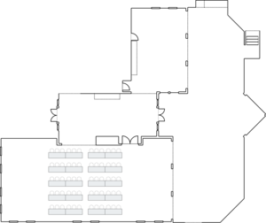 Classroom-style seating arrangement in event space.